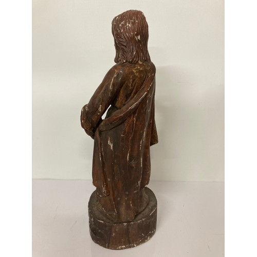 329 - C19th religious carved wooden figures of a man and a boy with painted jesso surface finish. 20 inche... 