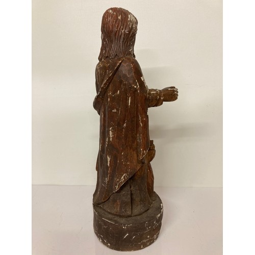 329 - C19th religious carved wooden figures of a man and a boy with painted jesso surface finish. 20 inche... 