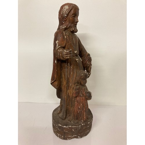 329 - C19th religious carved wooden figures of a man and a boy with painted jesso surface finish. 20 inche... 