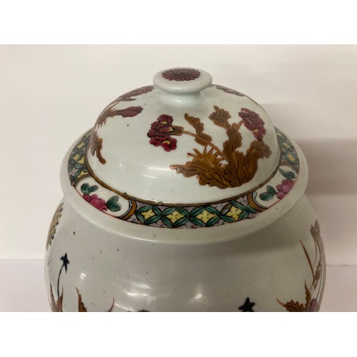 330 - Chinese pottery lidded vase on later stand, 16 inches high. Chip to underside of the lid and hairlin... 