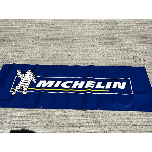 367 - Garage advertising signage, a large Michelin tyres promotional banner

The lot is available for in-h... 