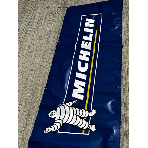 367 - Garage advertising signage, a large Michelin tyres promotional banner

The lot is available for in-h... 