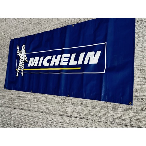 367 - Garage advertising signage, a large Michelin tyres promotional banner

The lot is available for in-h... 