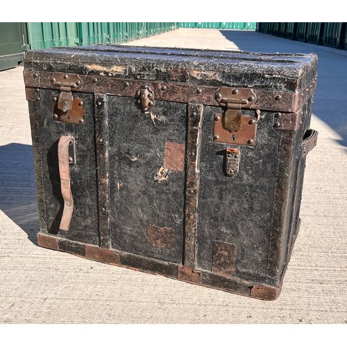 7 - Leather covered trunk with wood and metal bindings and inner tray, monogramed plaque to the top date... 