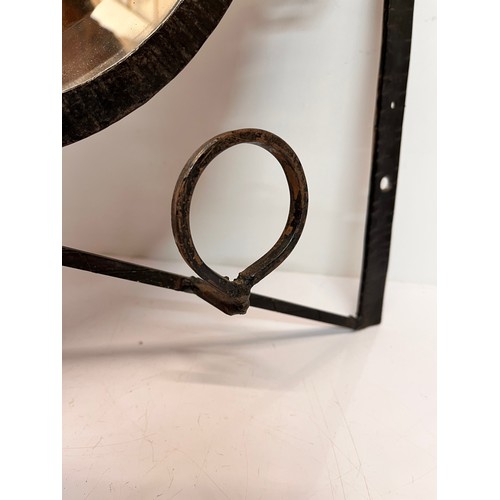 12 - Artisan made Arts and Crafts wrought iron unit, hat and coat rail with hall mirror to the centre, de... 