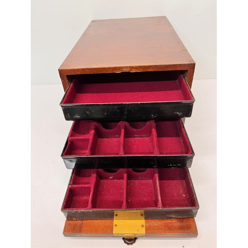 16 - Mahogany collectors cabinet with three metal drawers inside, fitted with campaign handles at each en... 