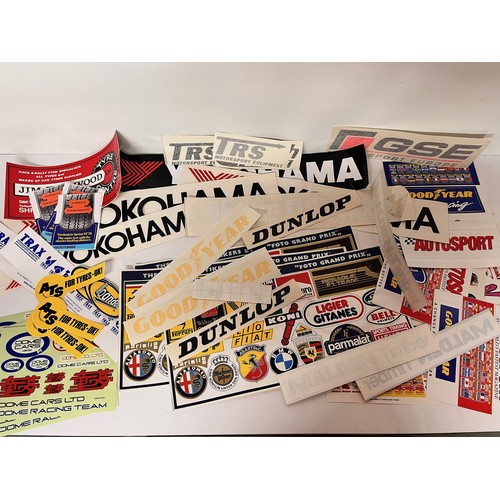 85 - Automobilia, vintage motor racing rally stickers Gwyndaf Evans sponsorship tyres etc. 50+

This lot ... 