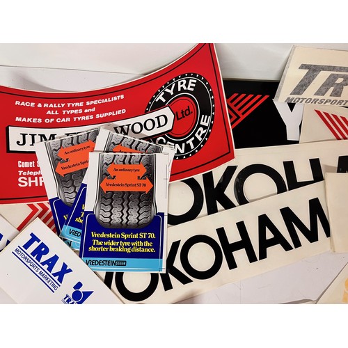 85 - Automobilia, vintage motor racing rally stickers Gwyndaf Evans sponsorship tyres etc. 50+

This lot ... 