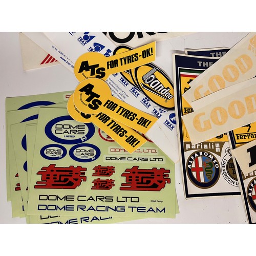 85 - Automobilia, vintage motor racing rally stickers Gwyndaf Evans sponsorship tyres etc. 50+

This lot ... 