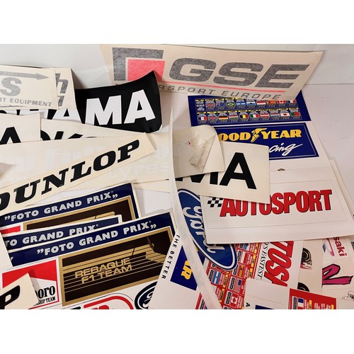 85 - Automobilia, vintage motor racing rally stickers Gwyndaf Evans sponsorship tyres etc. 50+

This lot ... 