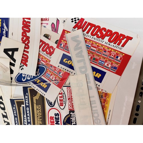 85 - Automobilia, vintage motor racing rally stickers Gwyndaf Evans sponsorship tyres etc. 50+

This lot ... 