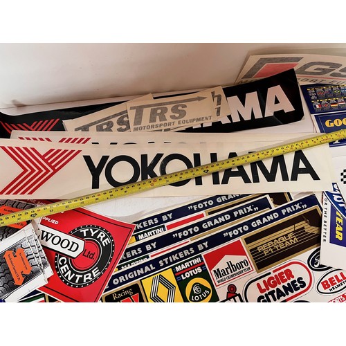 85 - Automobilia, vintage motor racing rally stickers Gwyndaf Evans sponsorship tyres etc. 50+

This lot ... 