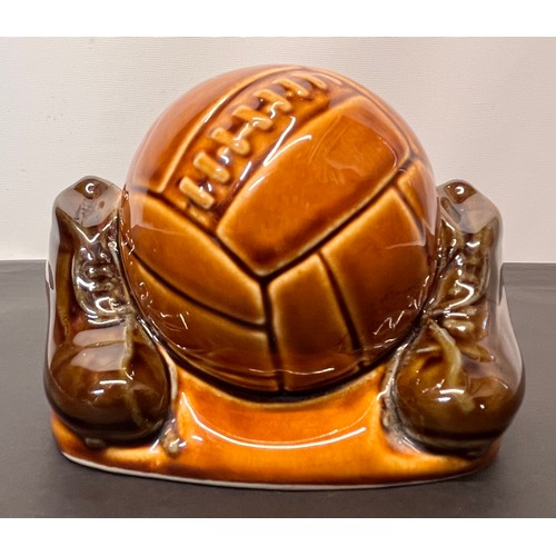 88 - Sports collectable, football themed ceramic money box from early 60’s by Studio Szeiler

This lot is... 