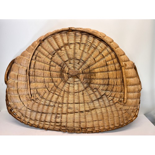 93 - Large wicker demi lune display basket 102 cm wide x 74 cm.

This lot is collection only