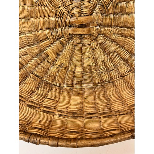 93 - Large wicker demi lune display basket 102 cm wide x 74 cm.

This lot is collection only