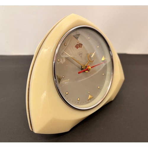 100 - Mid Century alarm clock in an ivory coloured lucite case.

This lot is available for in-house shippi... 