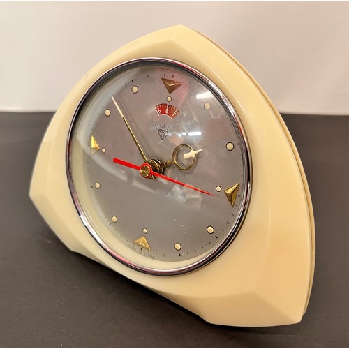 100 - Mid Century alarm clock in an ivory coloured lucite case.

This lot is available for in-house shippi... 