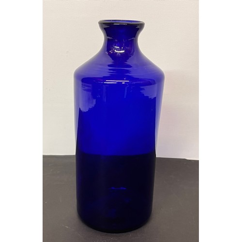 107 - Bristol Blue glass bottle 8.5 inches high.

This lot is available for in-house shipping