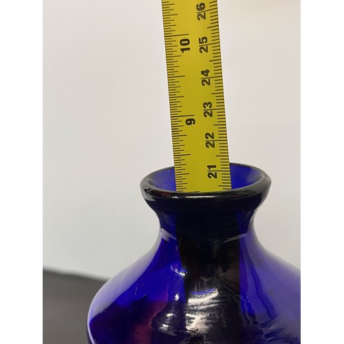 107 - Bristol Blue glass bottle 8.5 inches high.

This lot is available for in-house shipping