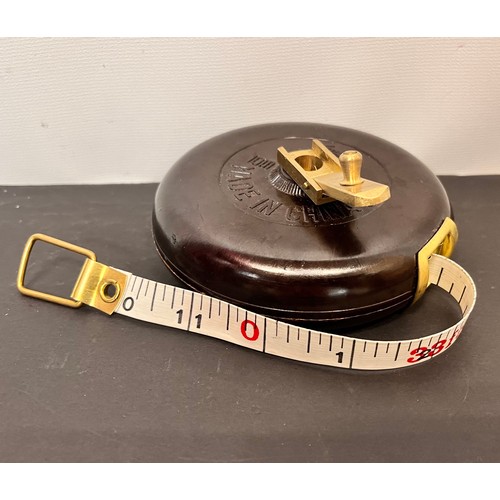 113 - Cased tape measure, 10m or 33ft 

This lot is available for in-house shipping