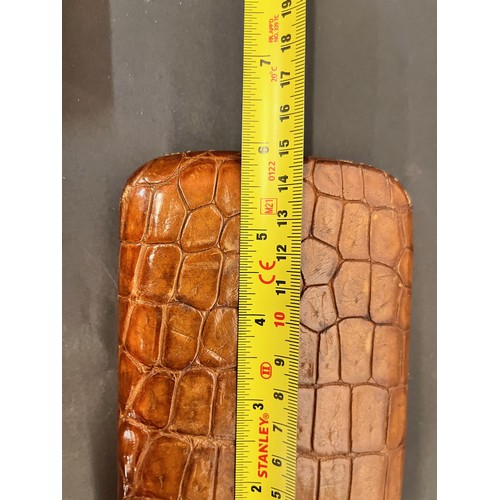 114 - Crocodile skin cigar case 6 inches long

This lot is available for in-house shipping