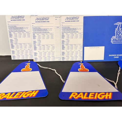 126 - Cycling ephemera, vintage Raleigh price tags and savings scheme cards.

This lot is available for in... 