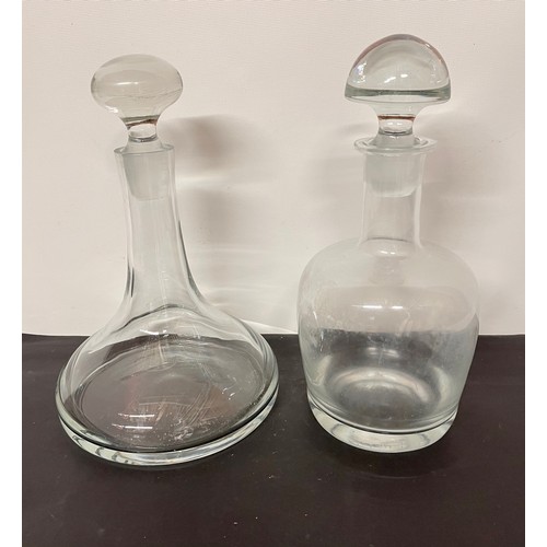 139 - Two Mid century designer glass decanters each 30 cm high.

This lot is available for in-house shippi... 