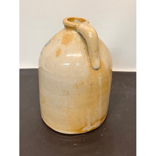 147 - Stoneware Whiskey flagon decorated with a bird in a floral composition.

15 cm high overall.

This l... 