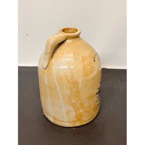 147 - Stoneware Whiskey flagon decorated with a bird in a floral composition.

15 cm high overall.

This l... 