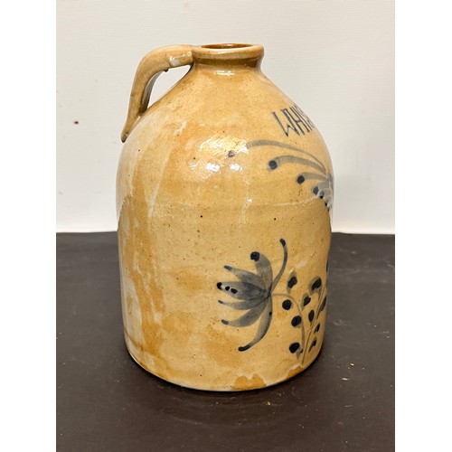 147 - Stoneware Whiskey flagon decorated with a bird in a floral composition.

15 cm high overall.

This l... 