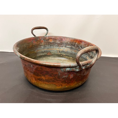 148 - Two handled copper pan 35 cm in diameter, superb colour.

This lot is available for in-house shippin... 