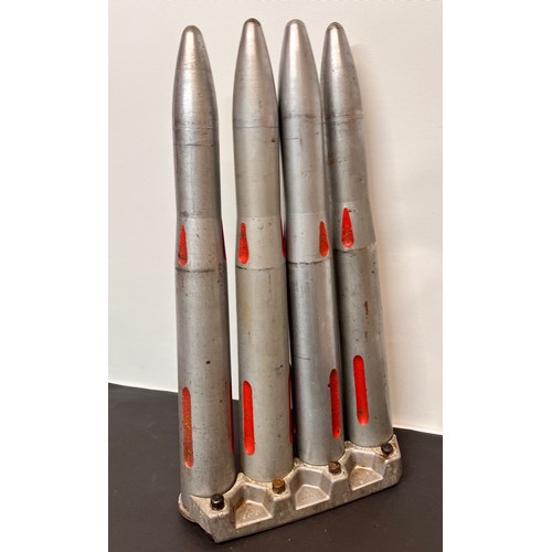 160 - Militaria, bofors gun training rounds, 4 18 inch long rounds secured in storage clip.

This lot is a... 