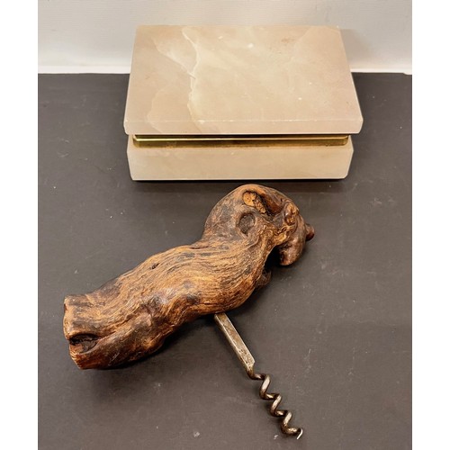 191 - Onyx cigarette box 14 cm x 10 cm and a bottle opener with a vine root handle.

This lot is available... 