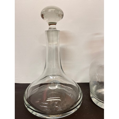 206 - Two Mid century designer glass decanters each 30 cm high.

This lot is available for in-house shippi... 