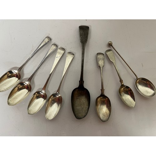 309 - Eight serving spoons, seven with english silver hallmarks and one without, 504 grams and the largest... 