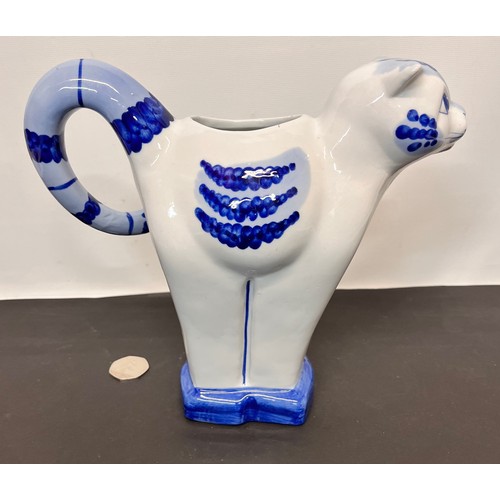 12 - Art Deco studio pottery jug in the form of a cat, 21 cm high


This lot is available for in-house sh... 