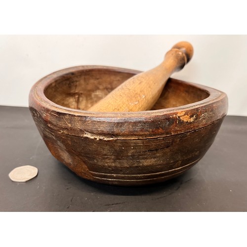 21 - Hardwood mortar and pestle, 19cm in diameter.

This lot is available for in-house shipping