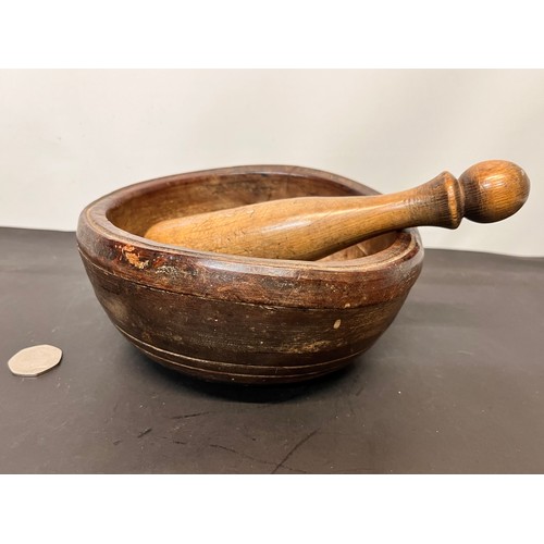 21 - Hardwood mortar and pestle, 19cm in diameter.

This lot is available for in-house shipping