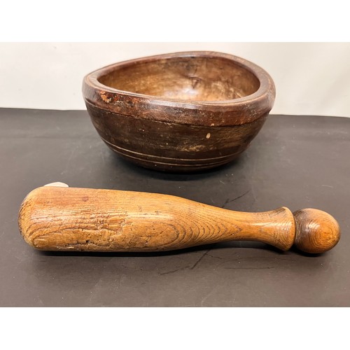 21 - Hardwood mortar and pestle, 19cm in diameter.

This lot is available for in-house shipping