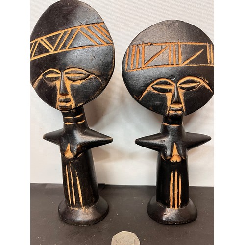 22 - Two West African carved tribal art fertility figures.

This lot is available for in-house shipping