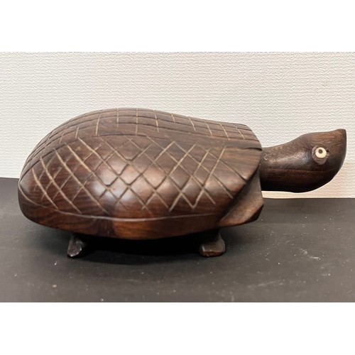 45 - Tribal art, hand carved turtles and a tortoise.


This lot is available for in-house shipping