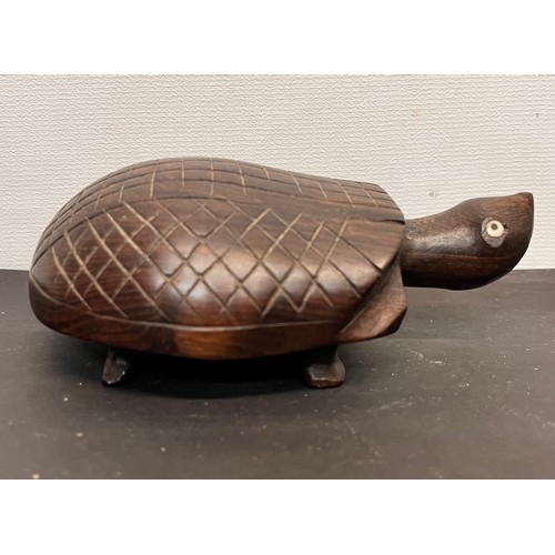 45 - Tribal art, hand carved turtles and a tortoise.


This lot is available for in-house shipping