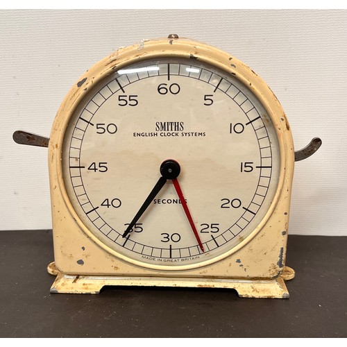 48 - Vintage scientific instruments, a metal cased Smiths Stop Clock.

This lot is available for in-house... 