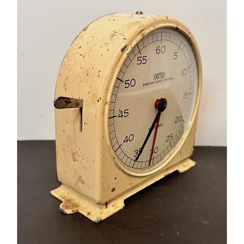 48 - Vintage scientific instruments, a metal cased Smiths Stop Clock.

This lot is available for in-house... 