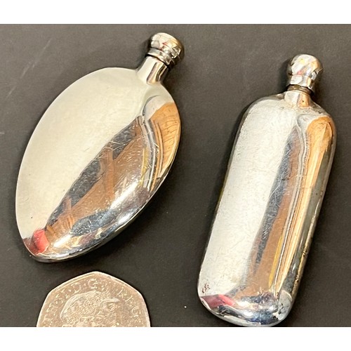 56 - Two plated perfume flasks.

This lot is available for in-house shipping