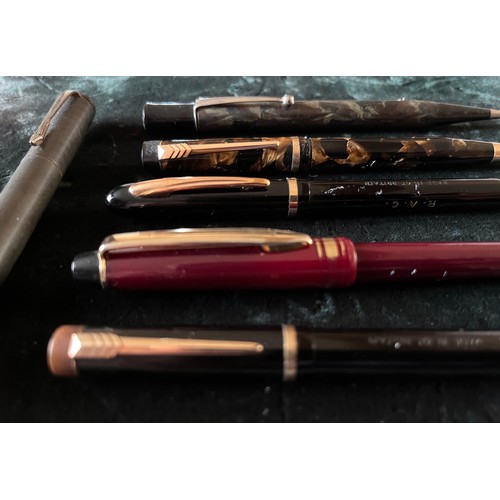 76 - Vintage writing instruments, propelling pencils, Croxley with 12ct Gold fittings etc.      15.

This... 