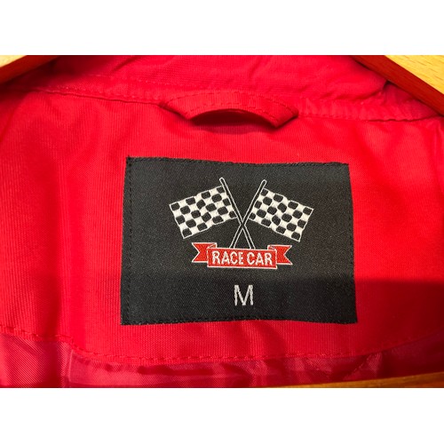 81 - Vintage clothing, ladies, gents Ferrari style motor racing themed jacket, size medium.

This lot is ... 