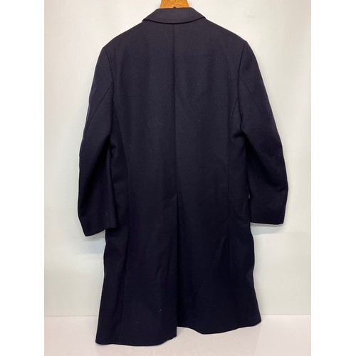 86 - Vintage gents clothing, classic dark blue woollen overcoat, sixe is XL.

This lot is available for i... 