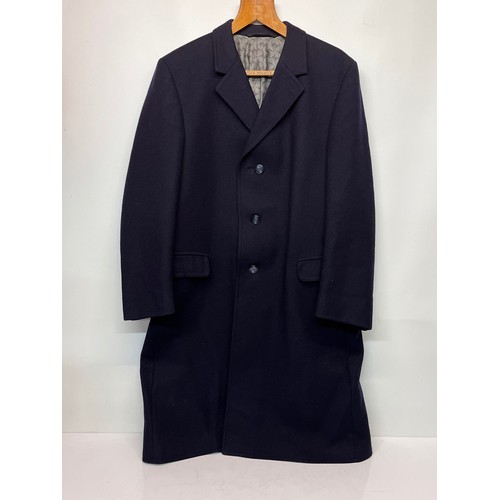 86 - Vintage gents clothing, classic dark blue woollen overcoat, sixe is XL.

This lot is available for i... 