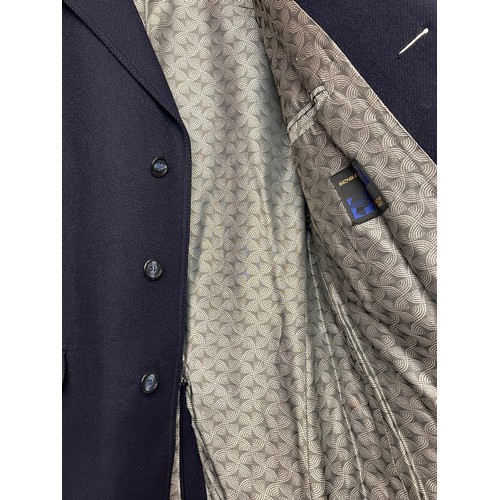 86 - Vintage gents clothing, classic dark blue woollen overcoat, sixe is XL.

This lot is available for i... 